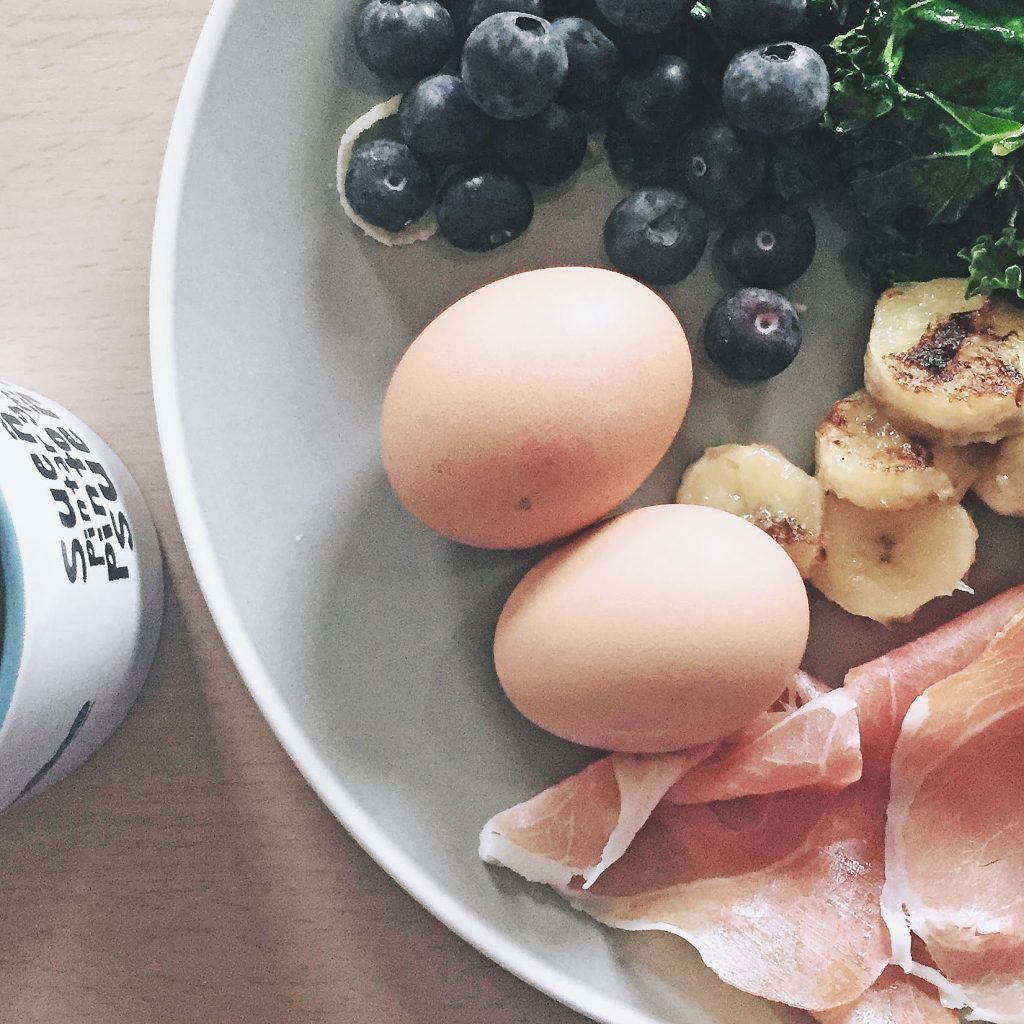 hard boiled egg, ham, blueberries and kale