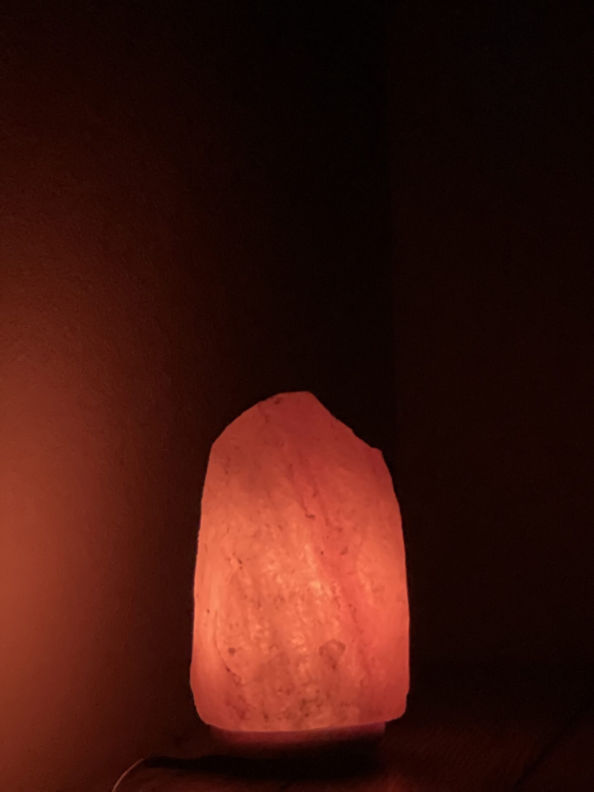 warm orange glow from a salt lamp